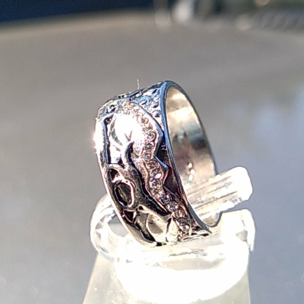 New women's silver and cubic zirconia accent band